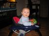 Merijn in zijn loopstoeltje., geplaatst door mama Lizanne op 2004-11-05