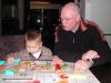 Merijn aan het kleien met Opa Herman., geplaatst door mama Lizanne op 2007-01-29